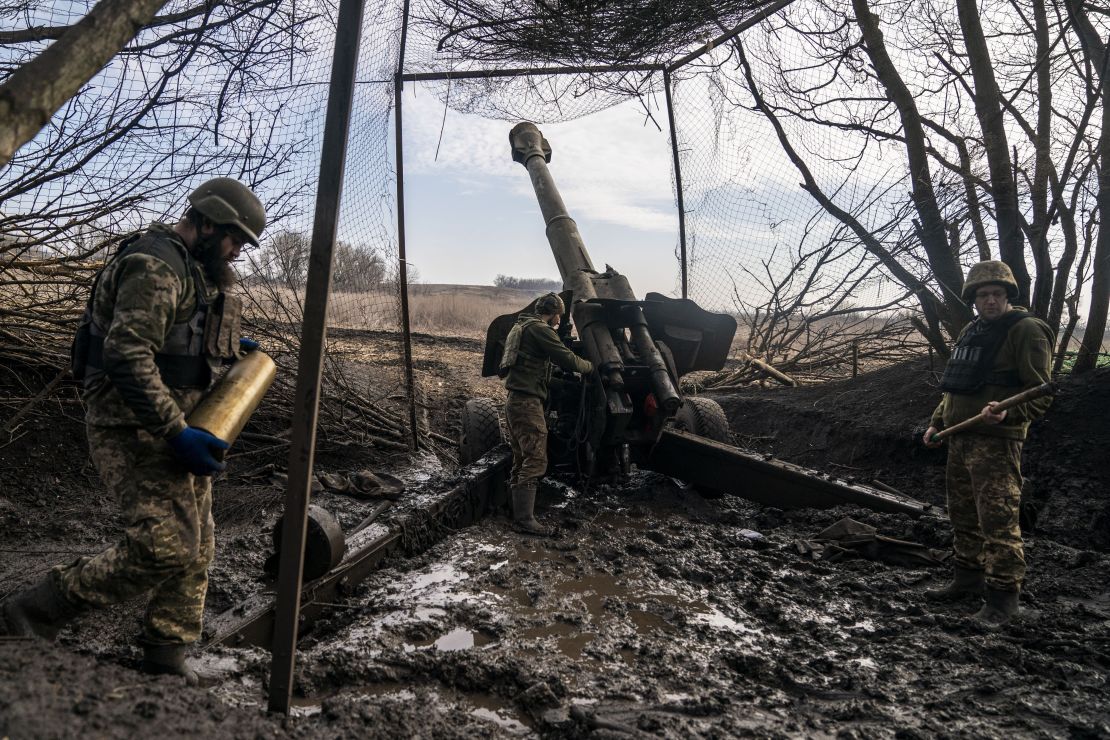 Ukrainian soldiers prepare a D20 artillery in Donetsk Oblast, Ukraine on Wednesday.